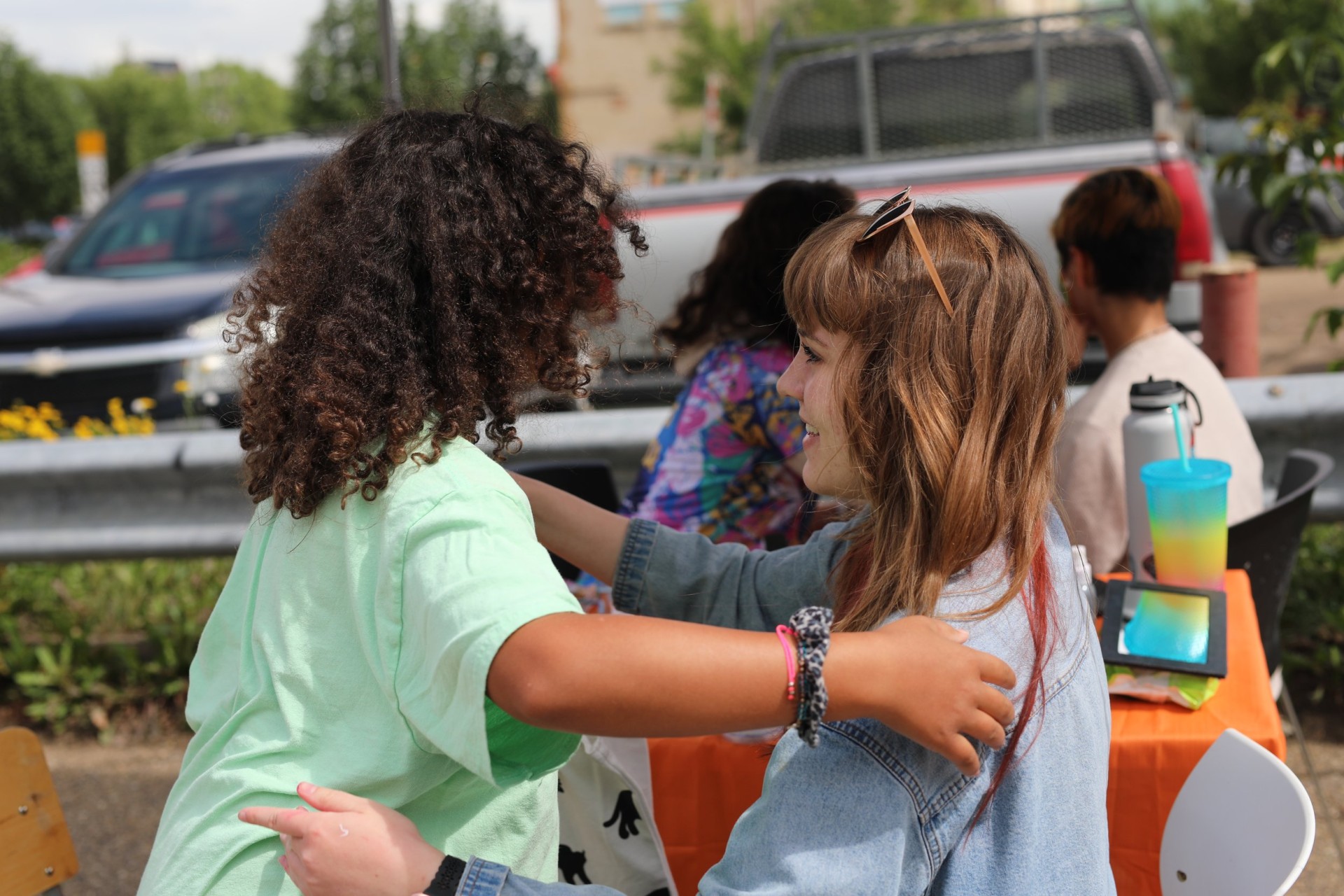 Youth giving each other a reassuring pat on the back